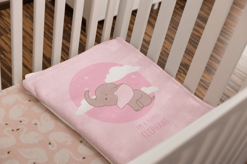 Mockup Of A Folded Throw Blanket On A Girl's Cradle