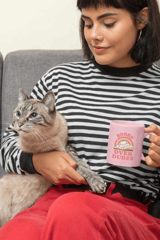 Mockup Of A Woman Holding An 11 Oz Mug With Her Cat