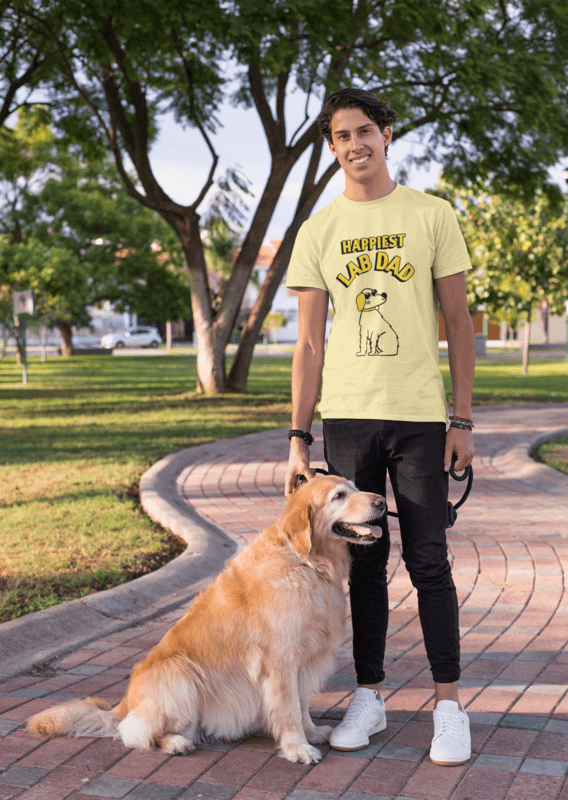 Shirt Mockup Of A Man Taking A Walk With His Dog At A Park