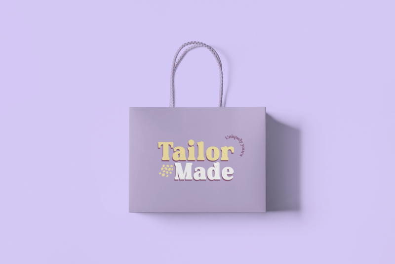 Minimal Mockup Featuring A Gift Bag Lying Over A Plain Color Surface