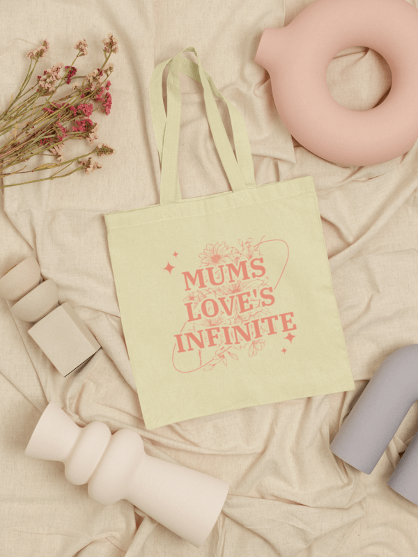 Mockup Of A Tote Bag Laid Flat In A Pottery Themed Setting