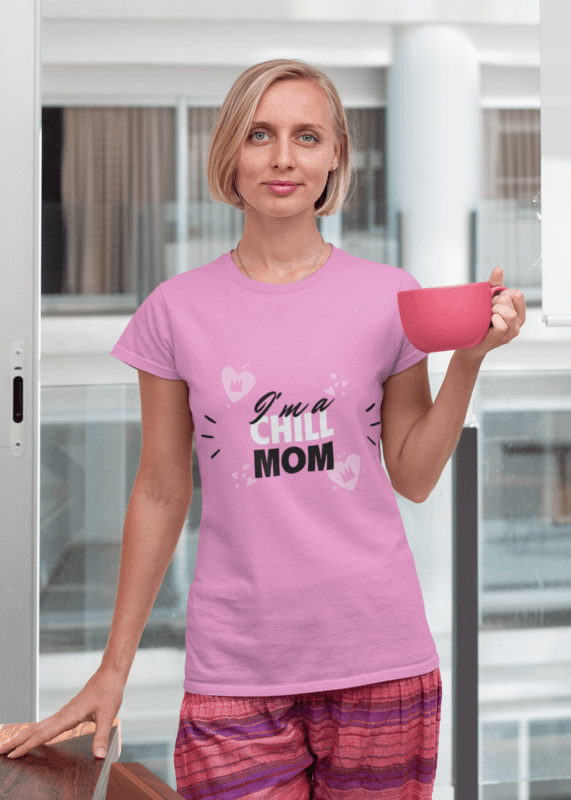 Mockup Of A Woman Wearing A Tee And Loose Pants While Holding A 24 Oz Coffee Mug
