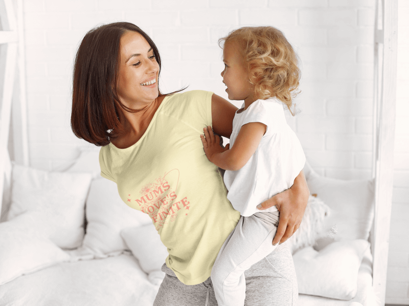 T Shirt Mockup Featuring A Mother Carrying Her Little Girl