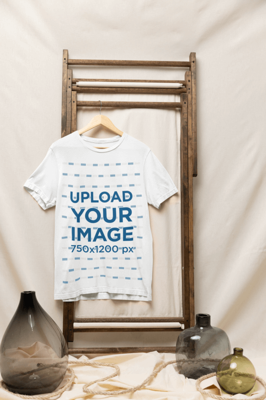 Mockup Of A Bella Canvas T Shirt Hanging On A Rustic Setting