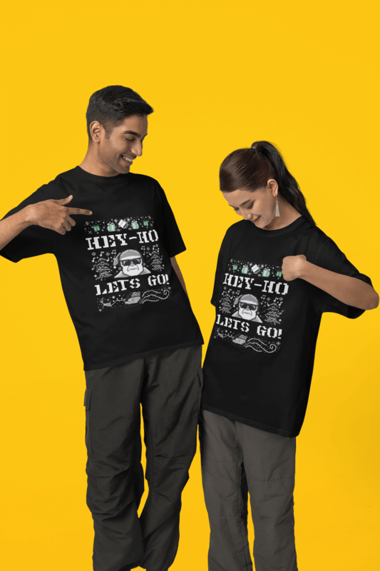 Mockup Of A Man And A Woman Pointing At Their Own Blinkstore T Shirt In A Studio