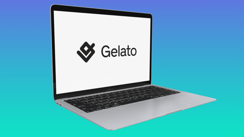 Silver Macbook Laptop Mockup Resting On A Colored Surface Showing The Gelato Logo