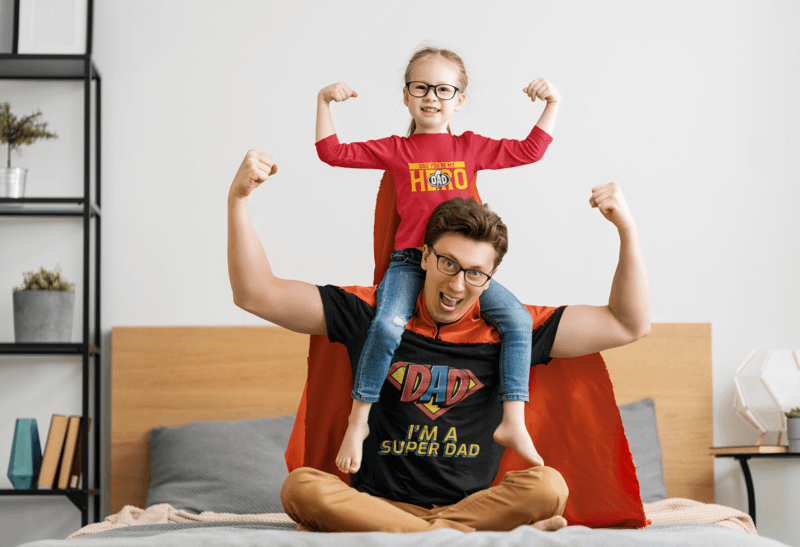 T Shirt Mockup Of A Girl And Her Dad Dressed As Superheroes For Personalized Father's Day Gifts Inspiration