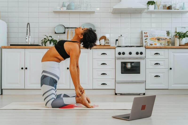Photo Of A Woman Doing Online Yoga Pexels