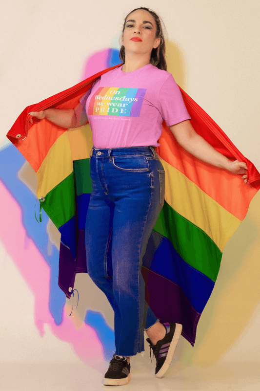 Bella Canvas T Shirt Mockup Of A Proud Woman With An LGBT Flag On Her Back