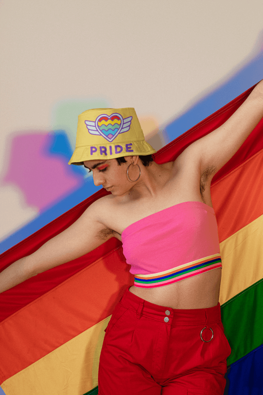 LGBTQ Themed Bucket Hat Mockup Featuring A Woman With The Pride Flag