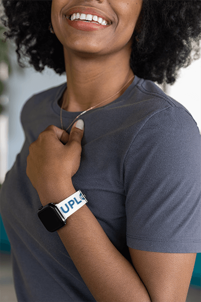 Mockup Of A Happy Woman Wearing A Smartwatch With A Customizable Watch Band