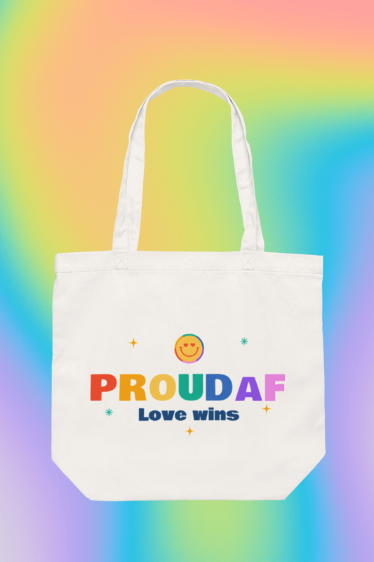 Mockup Of A Pride Tote Bag Flat Laid Over A Customizable Surface