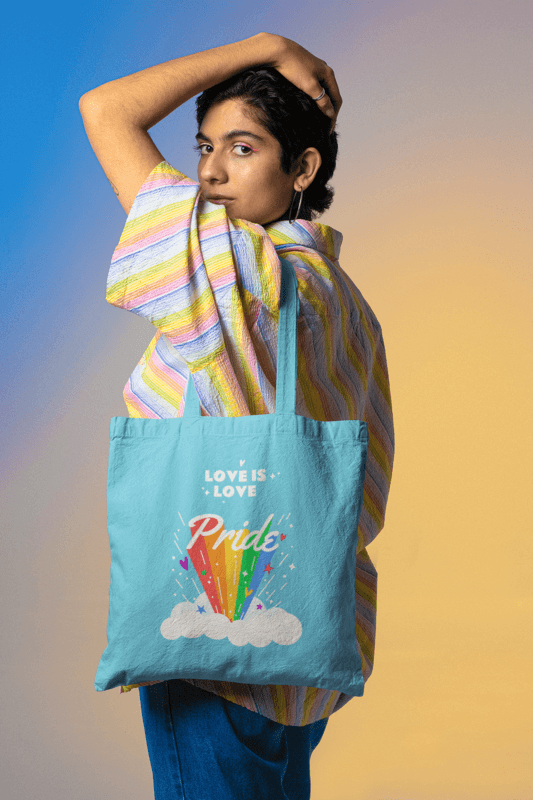 Mockup Of A Tote Bag Featuring A Woman With A Rainbow Shirt And A Pride Design
