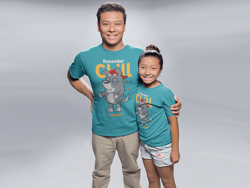 Mockup Of An Asian Man Hugging His Daughter Wearing T Shirts At A Photo Studio