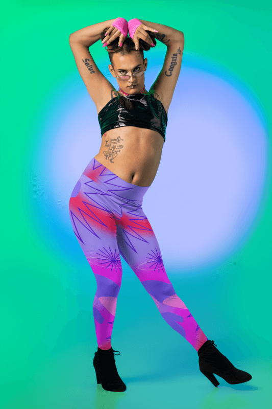 Vogue Inspired Mockup Featuring A Serious Woman Wearing Sublimated Pride Leggings