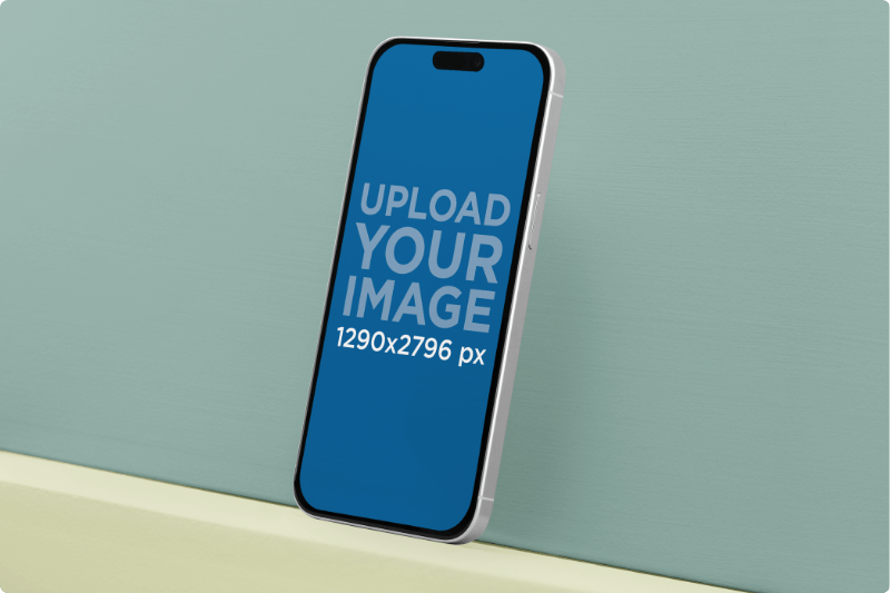 Mockup Of An Iphone 15 Pro Max Leaning Against A Customizable Surface