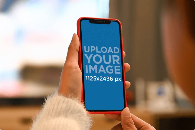 Over The Shoulder Mockup Of A Woman Using Her Iphone 11 Pro