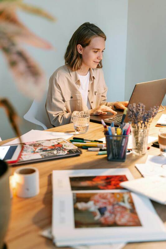 Photo Of A Designer In A Creative Environment By Pexels
