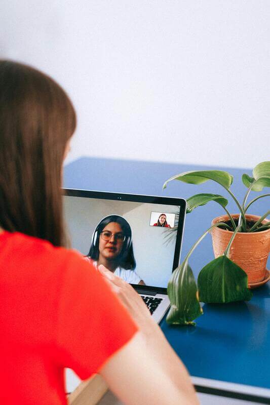 Photo Of Two Women On A Videoconference By Pexels