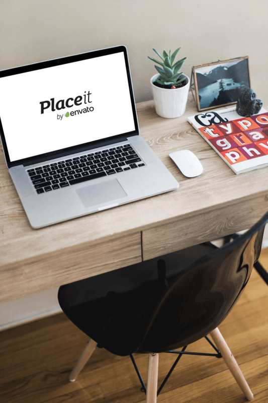 Macbook Mockup Featuring The Placeit By Envato Logo In A Comfortable Home Office