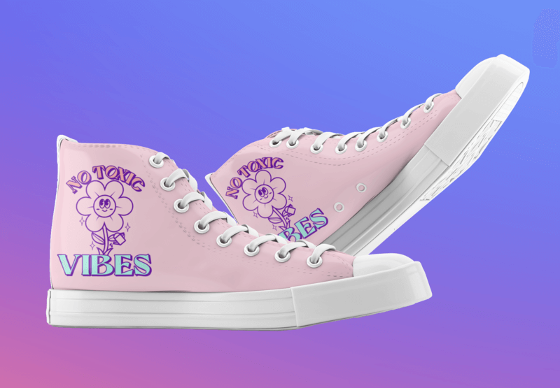 Mockup Of A Pair Of Canvas Sneakers Featuring A Flower Design