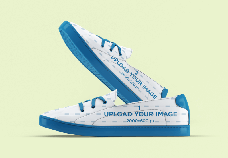 Mockup Of A Pair Of Sneakers On A Customizable Light Green Background