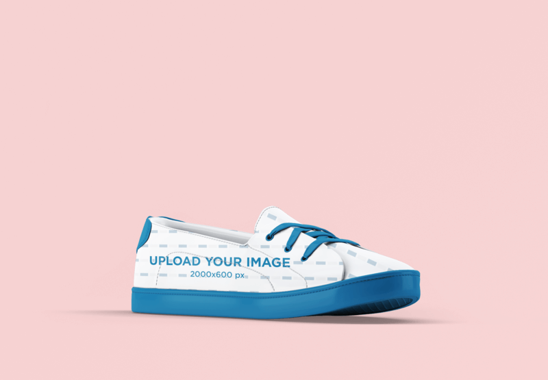 Shoe Mockup Featuring A Plain Pink Background
