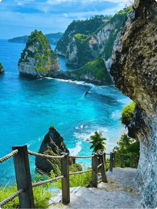 A Paradisiacal Place Showing The Turquoise Ocean And Mountain View