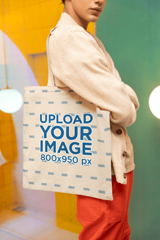 New Pop Wave Inspired Mockup Of A Man Carrying A Tote Bag On His Shoulder