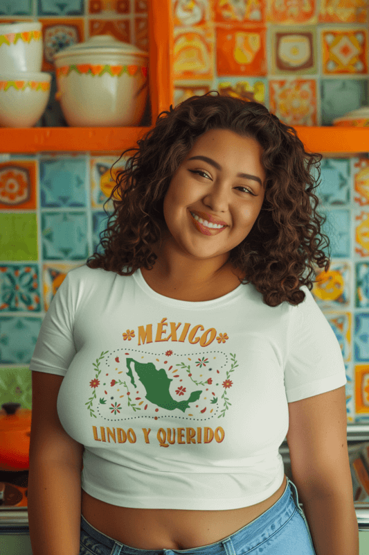 Mockup Of A Smiling Woman With Curly Hair Wearing A Crop Top In A Kitchen