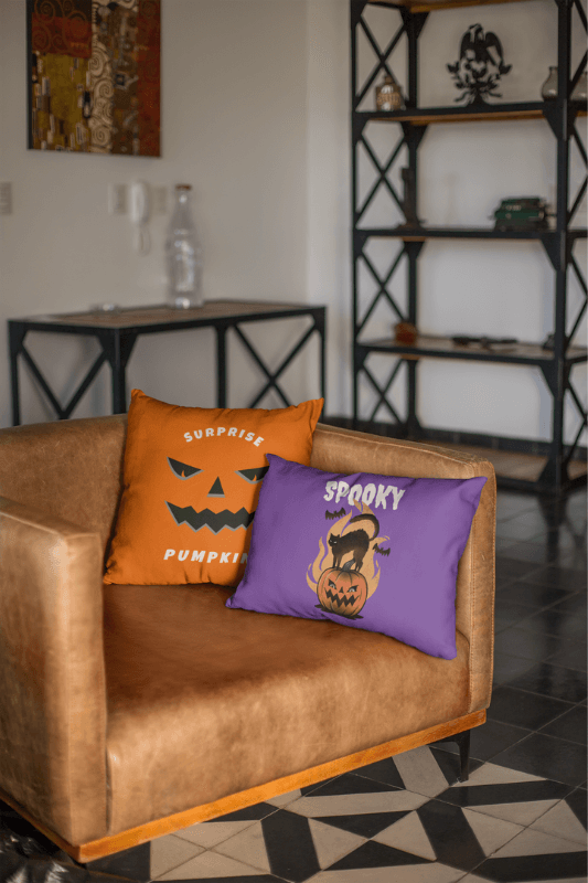 Mockup Of Two Throw Halloween Themed Pillows On A Leather Couch