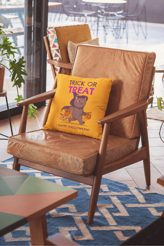 Mockup Of A Halloween Pillow On A Leather Armchair