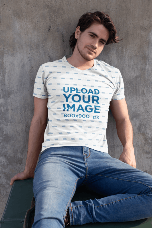 All Over V Neck T Shirt Mockup Of A Handsome Man Against A Concrete Wall