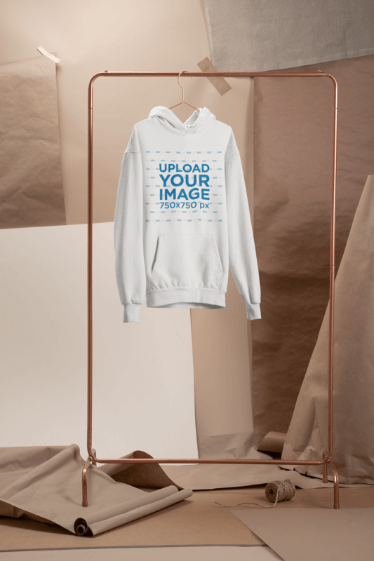 Men's Pullover Hoodie Mockup With A Minimal Kraft Paper Background