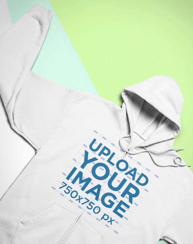 Mockup Of A Full Zip Hoodie Lying Flat Over A Custom Surface