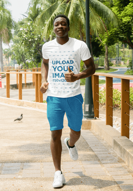 Mockup Of A Man Wearing V Neck T Shirt While Running