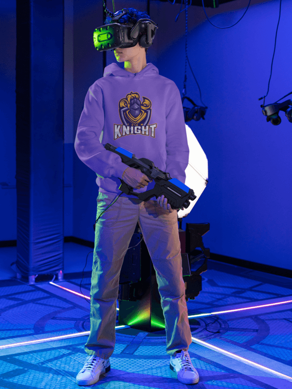 Mockup Of A Young Gamer With A Gaming Logo Hoodie Playing A Vr Shooting Game