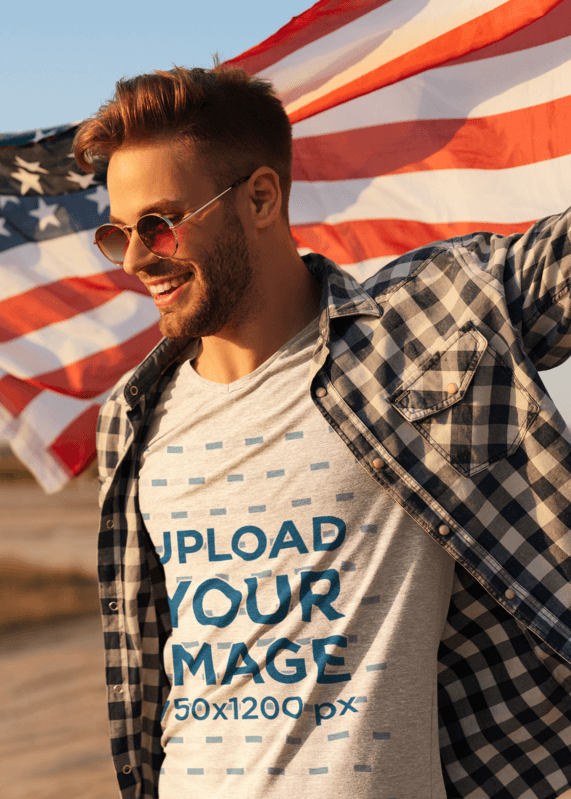 V Neck T Shirt Mockup Of A Stylish Man Holding An American Flag