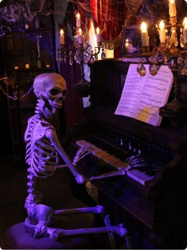 A Skull Playing The Piano In An Eerie, Abandoned House With Cobwebs