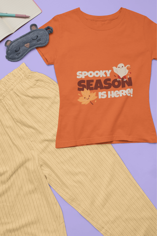 Flat Lay Tee Mockup Featuring A Halloween Orange Pajama Set