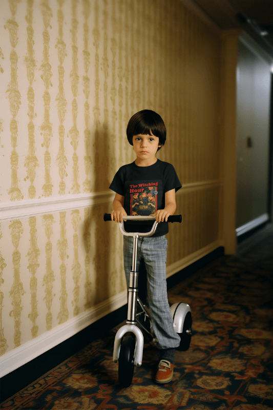 T Shirt Mockup Of An AI Generated Boy Riding A Scooter In A Hall Inspired By The Shining