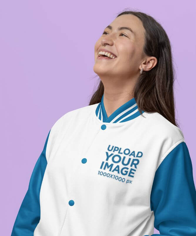 Bomber Jacket Mockup Featuring A Woman Posing With A Joyful Look