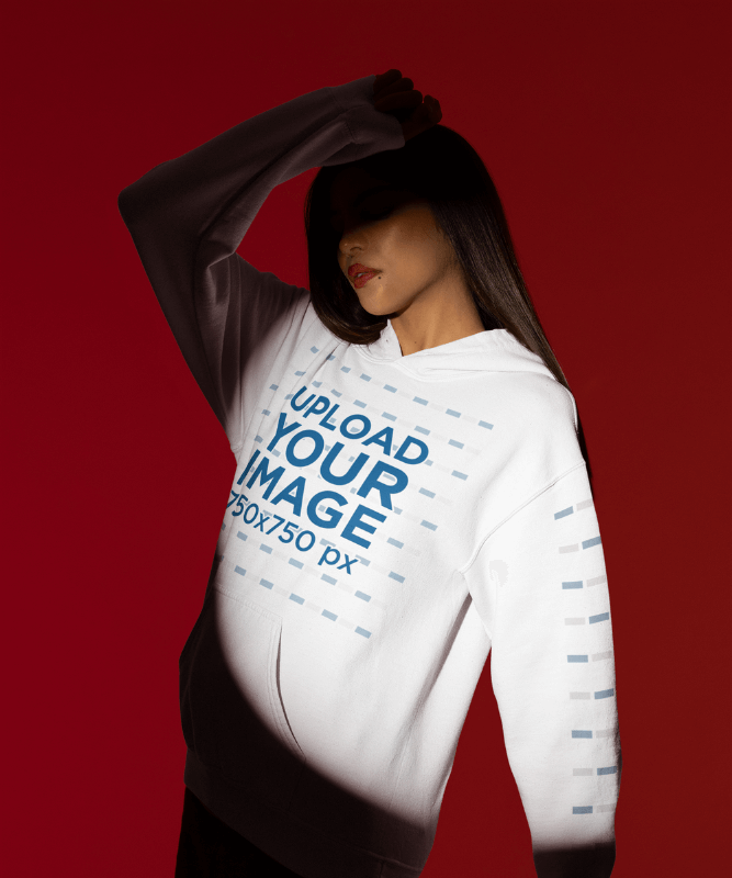 Gildan Pullover Hoodie Mockup Of A Woman Posing With A Serious Look In A Spotlight Setting