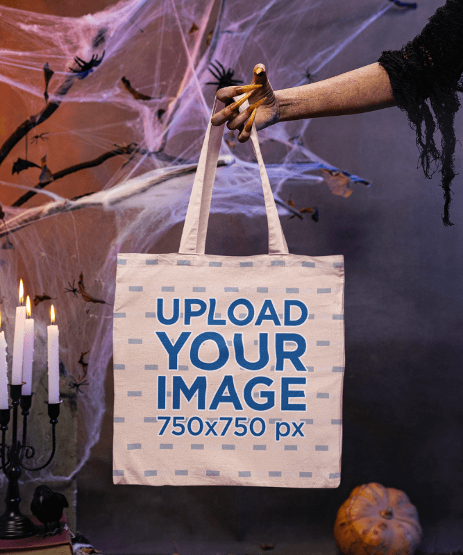 Halloween Inspired Mockup Featuring A Witch's Hand Holding A Tote Bag