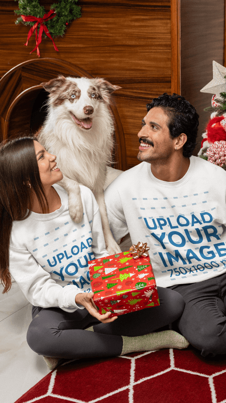 Xmas Themed Mockup Of A Smiling Couple Wearing Gildan Sweatshirts Next To Their Dog