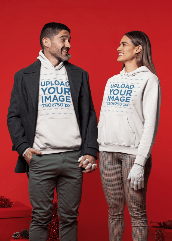 Blank Hoodie Mockup Of A Couple Holding Hands In A Christmas Setting