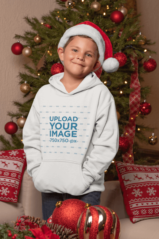 Blank Pullover Hoodie Mockup Of A Kid With A Santa Claus Hat On Christmas Day