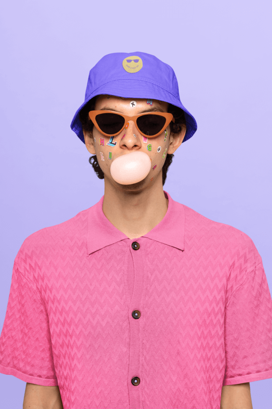 Bucket Hat Mockup Of A Man With Sunglasses Blowing A Gum Bubble