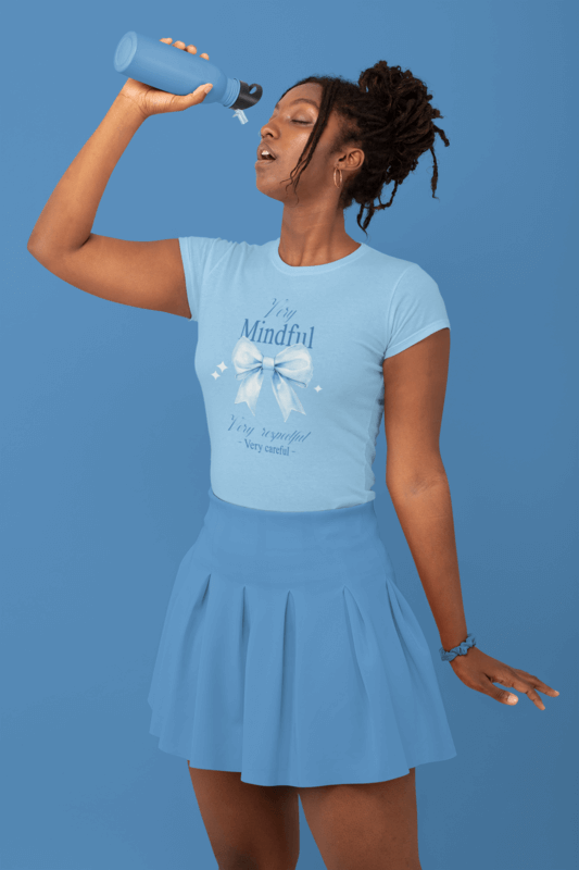 Light Blue Monochromatic T Shirt Mockup Of A Stylish Woman Drinking Water At A Studio