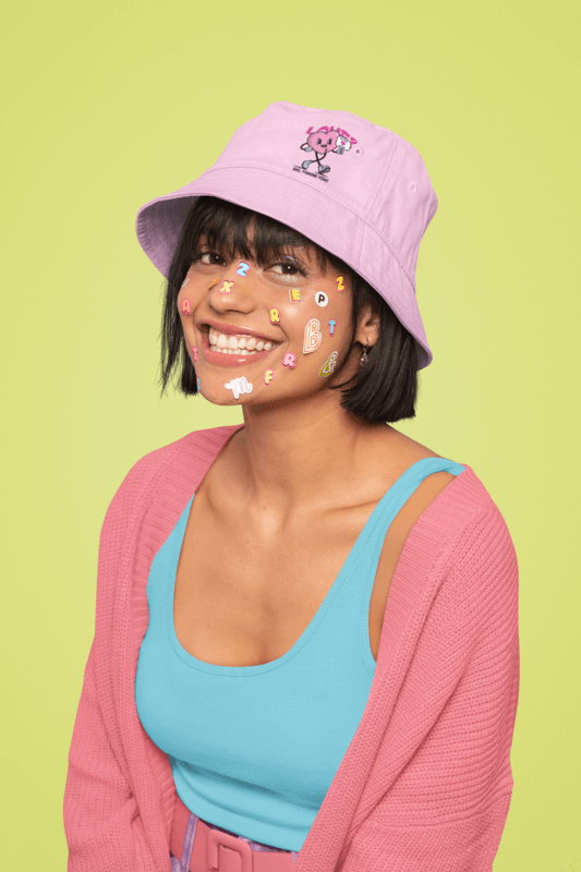 Bucket Hat Mockup Featuring A Smiling Woman With Colorful Stickers On Her Face